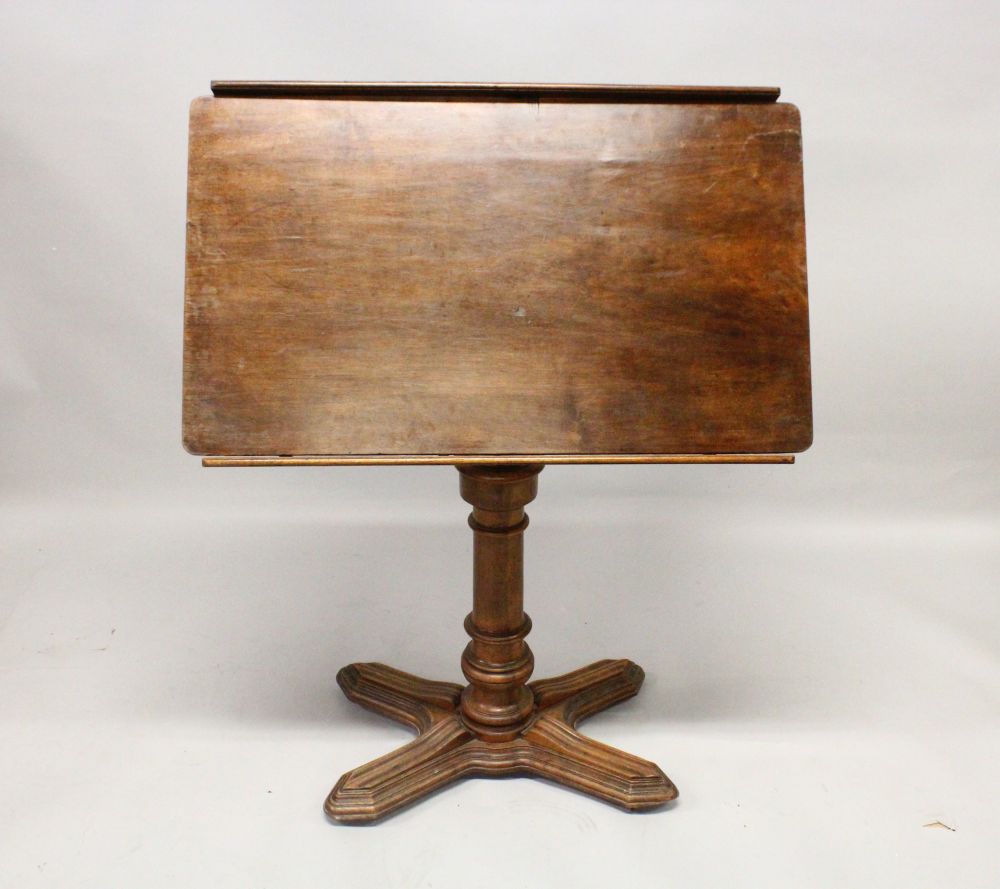 A 19TH CENTURY FRENCH MAHOGANY ADJUSTABLE READING TABLE, with tilting and rising top, on a turned - Image 3 of 4