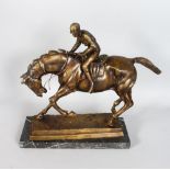 A BRONZE HORSE AND JOCKEY. 12ins high.