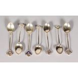 SEVEN PRESENTATION SILVER SPOONS.