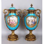 A SUPERB LARGE PAIR OF 19TH CENTURY SEVRES PORCELAIN AND ORMOLU MOUNTED URN SHAPED VASES AND COVERS,