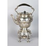 A GOOD VICTORIAN TEA KETTLE ON STAND with floral repousse decoration and acanthus. Birmingham