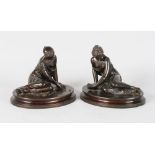 A VERY GOOD PAIR OF BRONZE CLASSICAL YOUNG LADY FIGURES, sitting on oval bases. 6ins high.