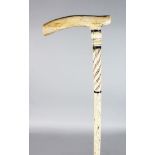 A 19TH CENTURY MARINE IVORY-HANDLED WALKING STICK with turned plain and twisted upper section, on