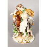 A CAPODIMONTE PORCELAIN GROUP, boy with dove, little girl by his side. 7.5ins high.