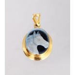 A SMALL GOLD AND INTAGLIO PENDANT, carved with a horses head.