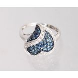A 10K WHITE GOLD, DIAMOND AND SAPPHIRE HEART SHAPE RING.