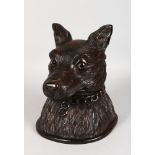 A LARGE BLACK FOREST CARVED WOOD DOG'S HEAD TOBACCO BOX with hinged lid and glass eyes. 12ins high.