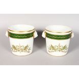 A PAIR OF LIMOGES JARDINIERES with swans and lion handles. 4.5ins high.
