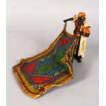 A GOOD AUSTRIAN PAINTED COLD CAST ARAB CARPET VENDOR. 9ins long.