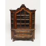 A GOOD 18TH CENTURY DUTCH MINIATURE VITRINE, with shaped top, glass door and sides, enclosing