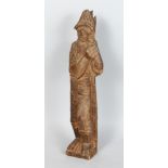 AN EARLY CARVED WOOD FIGURE OF A MAN. 18ins high.