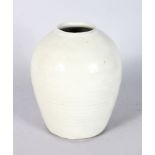 A BULBOUS VASE by RUPERT SPIRA, potted in a Korean style, with tapering ribbed body, pale Celadon