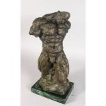 AN UNUSUAL ABSTRACT BRONZE, TORSO OF A MAN, on a rectangular marble base. 1ft 10ins high.