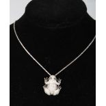 A WHITE GOLD AND DIAMOND SET FROG PENDANT, with chain.