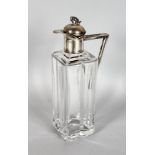 A GOOD FRENCH SQUARE GLASS CLARET JUG, with silver mounts, the cork stopper with a silver rabbit.