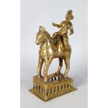 AN INDIAN BRONZE OF A HORSE AND RIDER.
