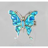 A SILVER AND REAL OPAL BUTTERFLY RING.