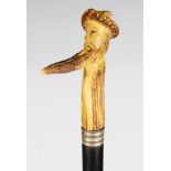 AN UNUSUAL CARVED HORN WALKING STICK, the handle as a man's head with very long beard. Handle: