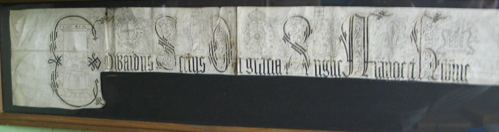 [PENMANSHIP] the top part of a vellum document, probably reign of HENRY VII, with fine