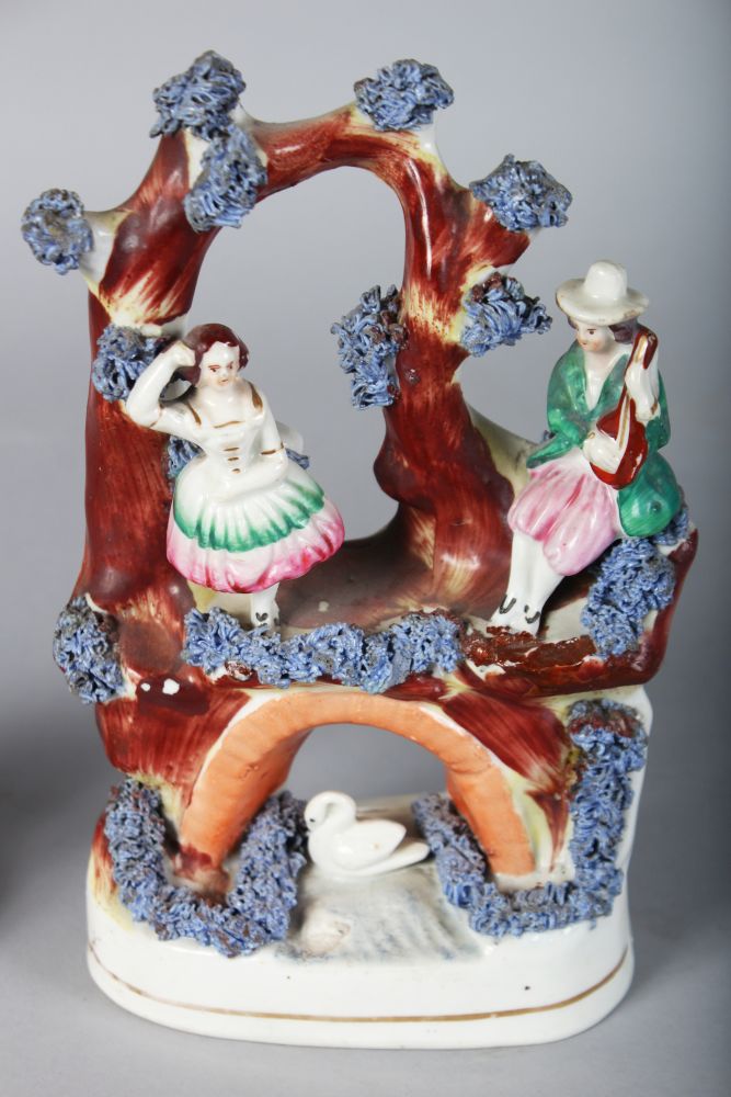 A STAFFORDSHIRE FIGURE OF A GIRL riding an encrusted goat, 5ins high, and AN ENCRUSTED ARCH with - Image 2 of 2