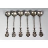 A SET OF SIX CHINESE SILVER COIN SPOONS.