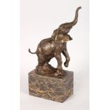 MILO A BRONZE ELEPHANT. Signed. 9.5ins high, on a marble plinth.