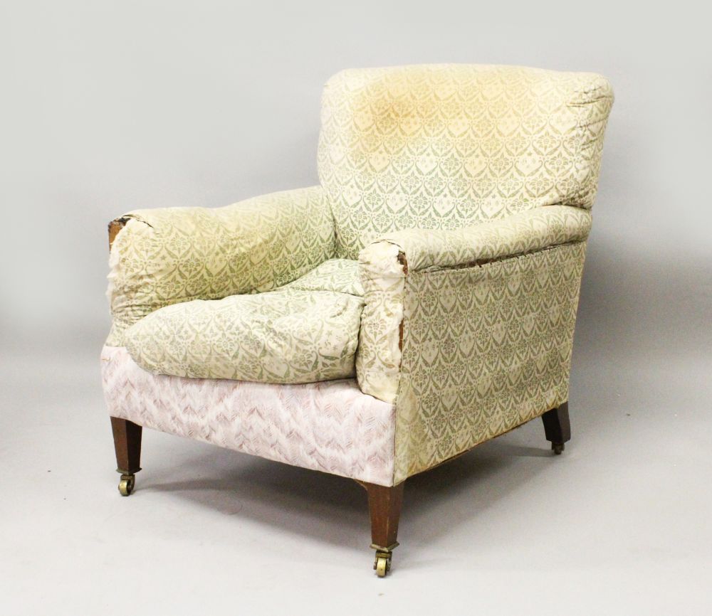 A MAHOGANY ARMCHAIR by HOWARD & SONS, 'DUTTON', EARLY 20TH CENTURY, the sides and back cushions