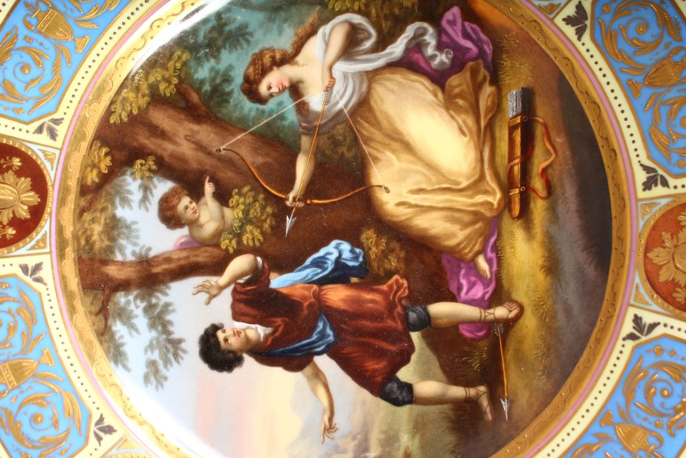 A VIENNA CIRCULAR PLATE, "Euryds Pastime", classical painted scene with gilt and enamel border. - Image 2 of 3