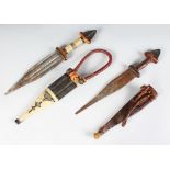 TWO LEATHER MOUNTED DAGGERS.
