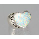 A SILVER AND HEART SHAPED OPAL RING.
