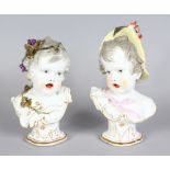 A GOOD PAIR OF 19TH CENTURY MEISSEN BUSTS OF CHILDREN, one with grapes in her hair, the other