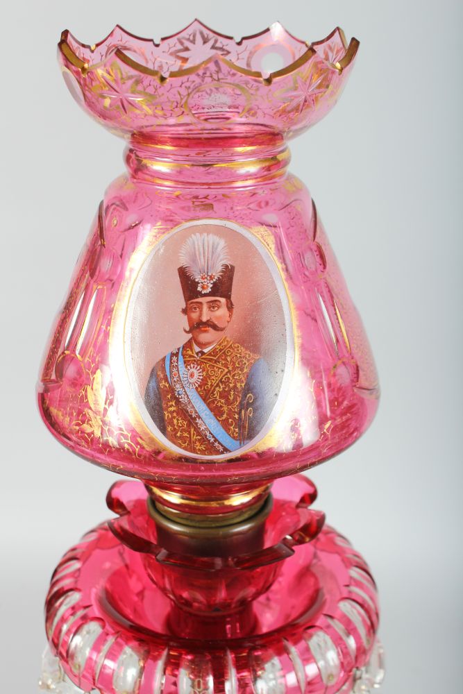 A SUPERB LARGE PAIR OF VICTORIAN BOHEMIAN RUBY GLASS LUSTRES, the domes gilded and painted with - Image 2 of 5