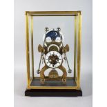 A GOOD GRASSHOPPER SKELETON CLOCK in a glass case. 16ins high.