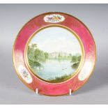 A PARIS PORCELAIN FINE PLATE painted with a titled scene of Buckingham Palace, London under a border
