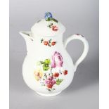 AN 18TH CENTURY VIENNA MILK JUG AND COVER painted with flowers, beehive mark in blue to base.