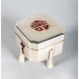 A GOOD SMALL CHINESE SILVER BOX AND COVER on four legs.