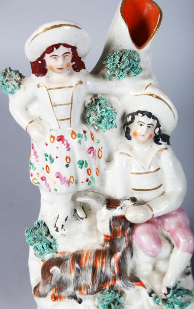 A STAFFORDSHIRE FIGURE OF A BOY with a bird and birds nest, 7.5ins, and A VASE GROUP, boy and girl - Image 3 of 3