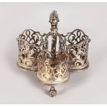 A VICTORIAN SILVER THREE BOTTLE CRUET STAND. London 1846. Maker: Garrards.