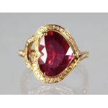 A 14K YELLOW GOLD AND DIAMOND RING SET WITH A HEART CUT SPINEL, approx. 4.25ct., diamonds approx.