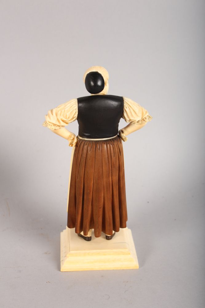 A VERY GOOD 19TH CENTURY FRENCH IVORY AND WOODEN FIGURE OF A WOMAN on a square base. 6.5ins high. - Image 2 of 2