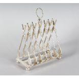 A SILVER PLATED CROSS OARS TOAST RACK.