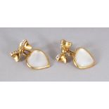 A PAIR OF YELLOW GOLD, DIAMOND AND MOTHER-OF-PEARL HEART SHAPED EARRINGS with screw backs.