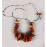 A VERY EARLY AMBER BEAD NECKLACE.