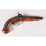 A 19TH CENTURY PERCUSSION CAP PISTOL with octagonal barrel and engraved stock. 10ins long.