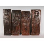 FOUR VARIOUS 18TH CENTURY CARVED WOOD PANELS, ST PETER ETC. 24ins long.