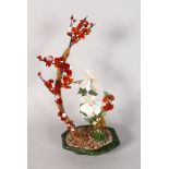 A JADE AND SEMI-PRECIOUS STONE FLOWERING TREE. 16ins high.