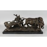 A FINE BRONZE GROUP, LIONS ATTACKING A BUFFALO. Signed. 24ins, on a marble base.