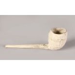 A CARVED CLAY PIPE, W. T. BLAKE, LONDON. 7.5ins long.