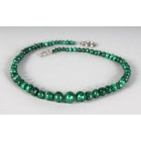 A GREEN MALACHITE NECKLACE.