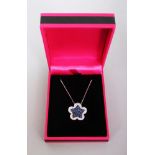 AN 18CT WHITE GOLD, SAPPHIRE AND DIAMOND FIVE LEAF CLOVER SHAPED PENDANT NECKLACE.